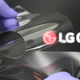 A photo of a foldable piece of plastic against the LG Chem logo